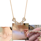 Collier en forme de cœur à quatre feuilles