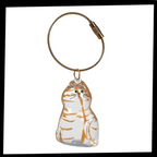Porte-clés capsule poils de chat