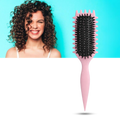 Brosse démêlante et définissante pour boucles
